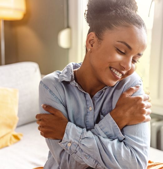 LAdy hugging herself